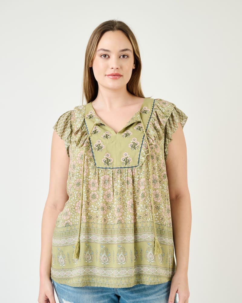 Front of a model wearing a size 1X Nancy Embroidered Floral Top in N688 Sage by Daniel Rainn. | dia_product_style_image_id:272073